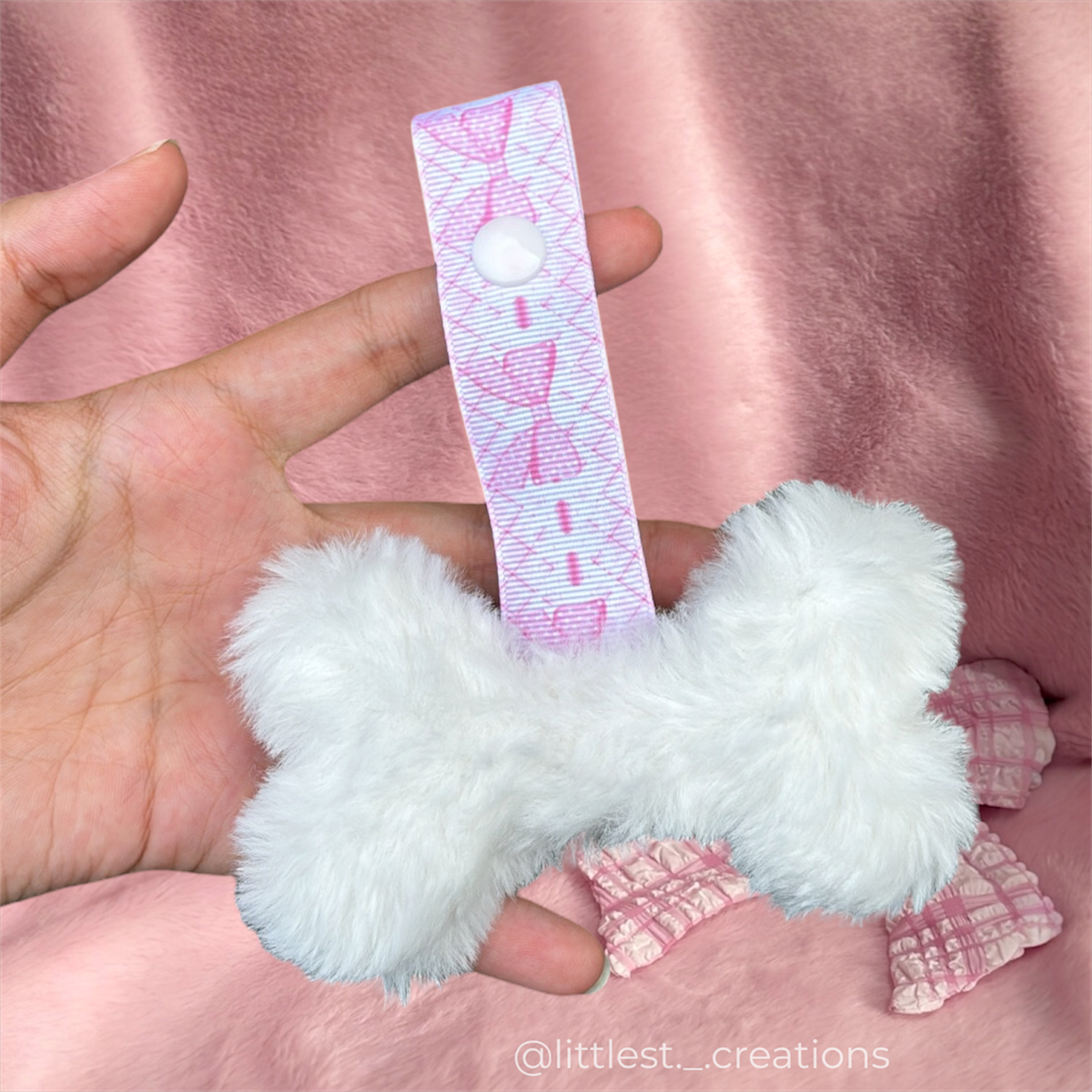 Pink bow bone paci clip