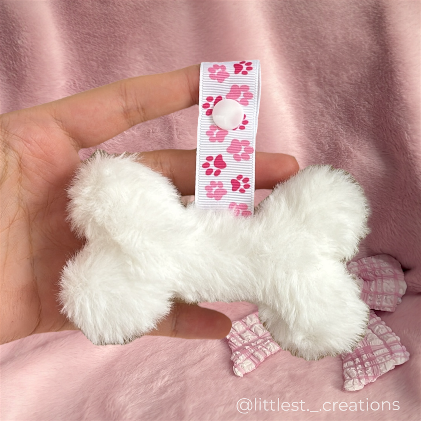 Pink paw bone paci clip