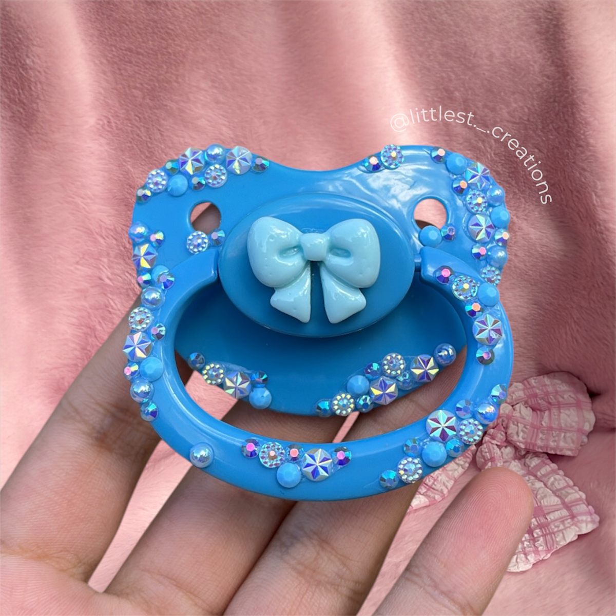 Blue bow paci