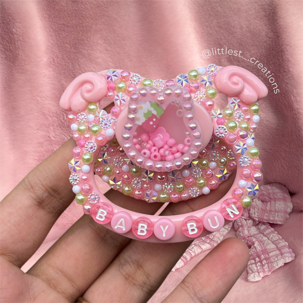 Baby bun dry shaker paci