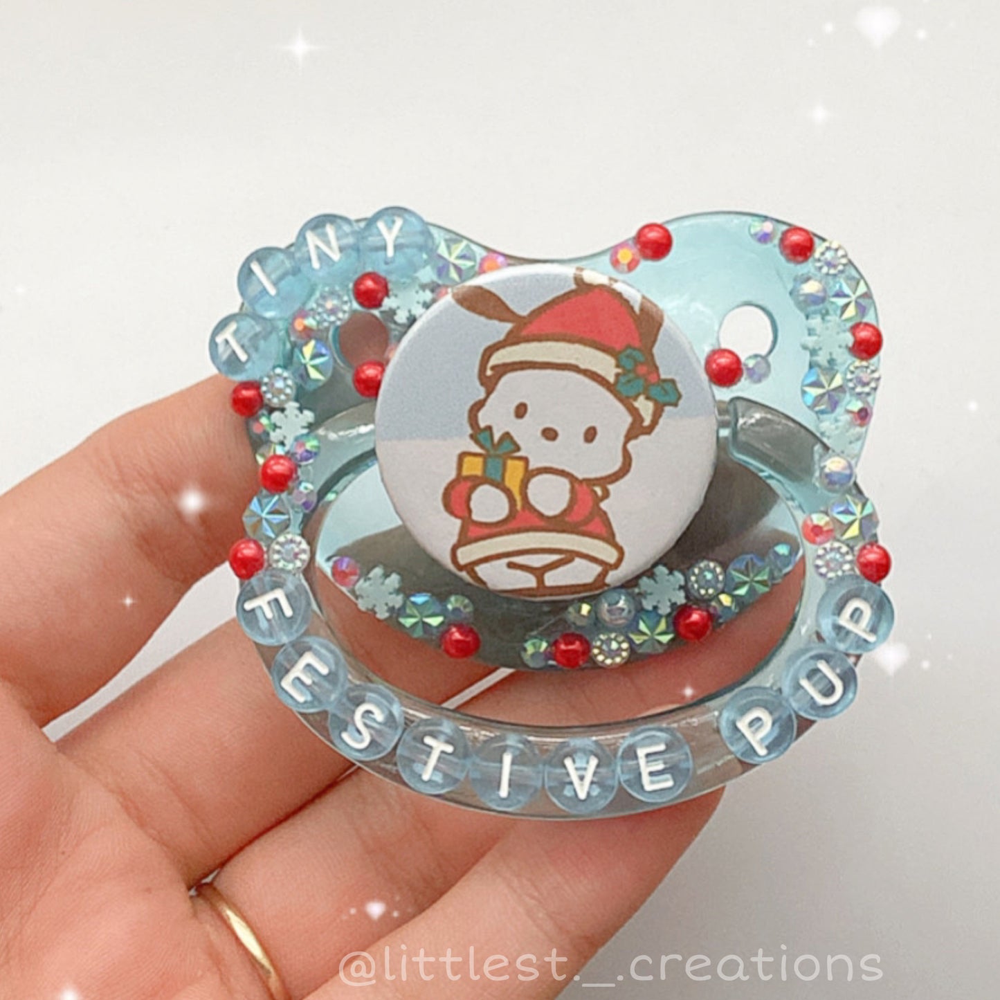 Tiny festive pup Deco Paci