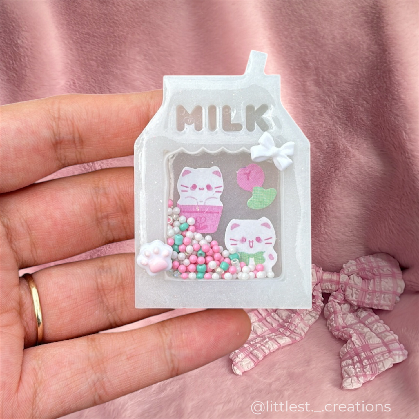Milk kitty pocket shaker rattle