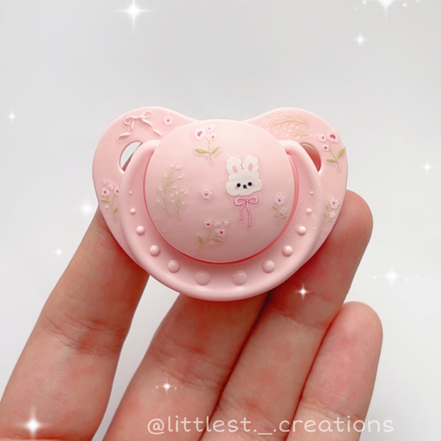 Dainty bun small shield paci