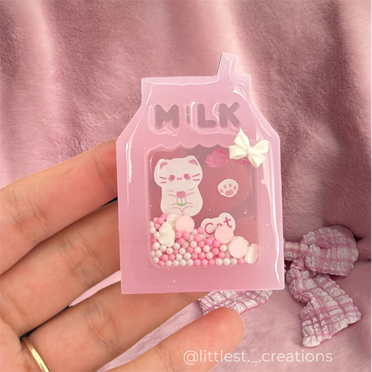 Milk kitty pocket shaker rattle