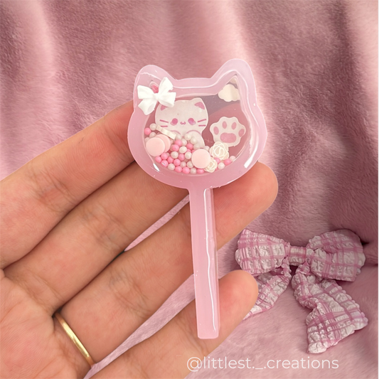 Mini kitty dry shaker rattle