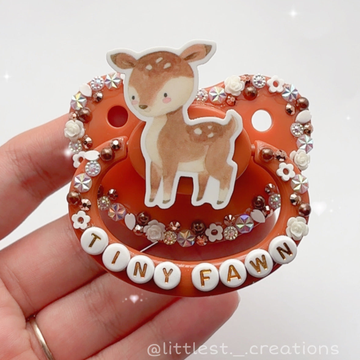 Tiny fawn Paci