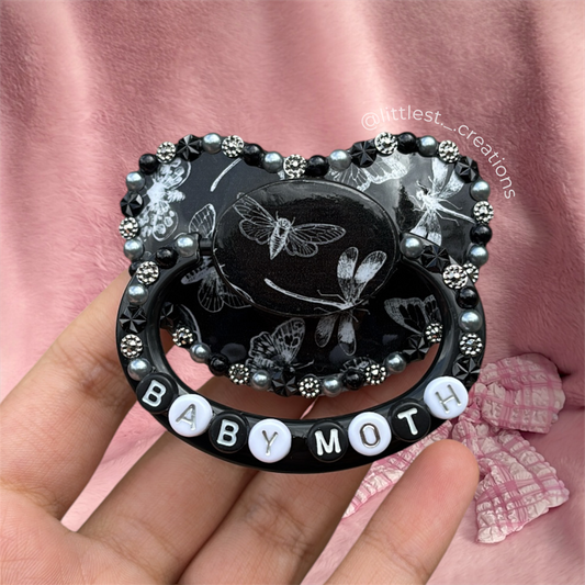 Baby moth image paci