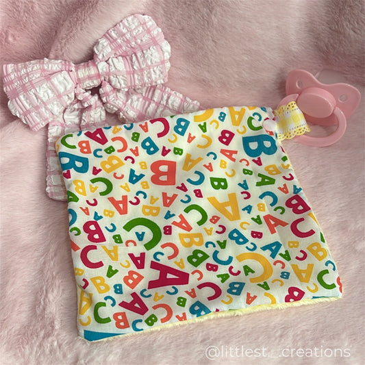 Alphabet pacifier blankie clip