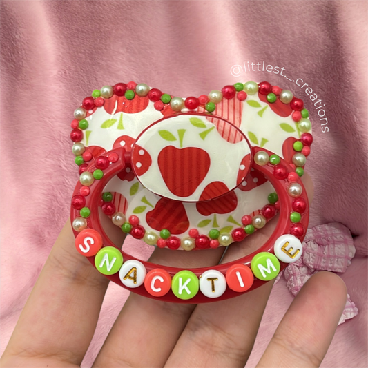 Snack time apple image paci