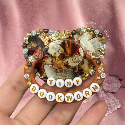 Tiny bookworm image paci