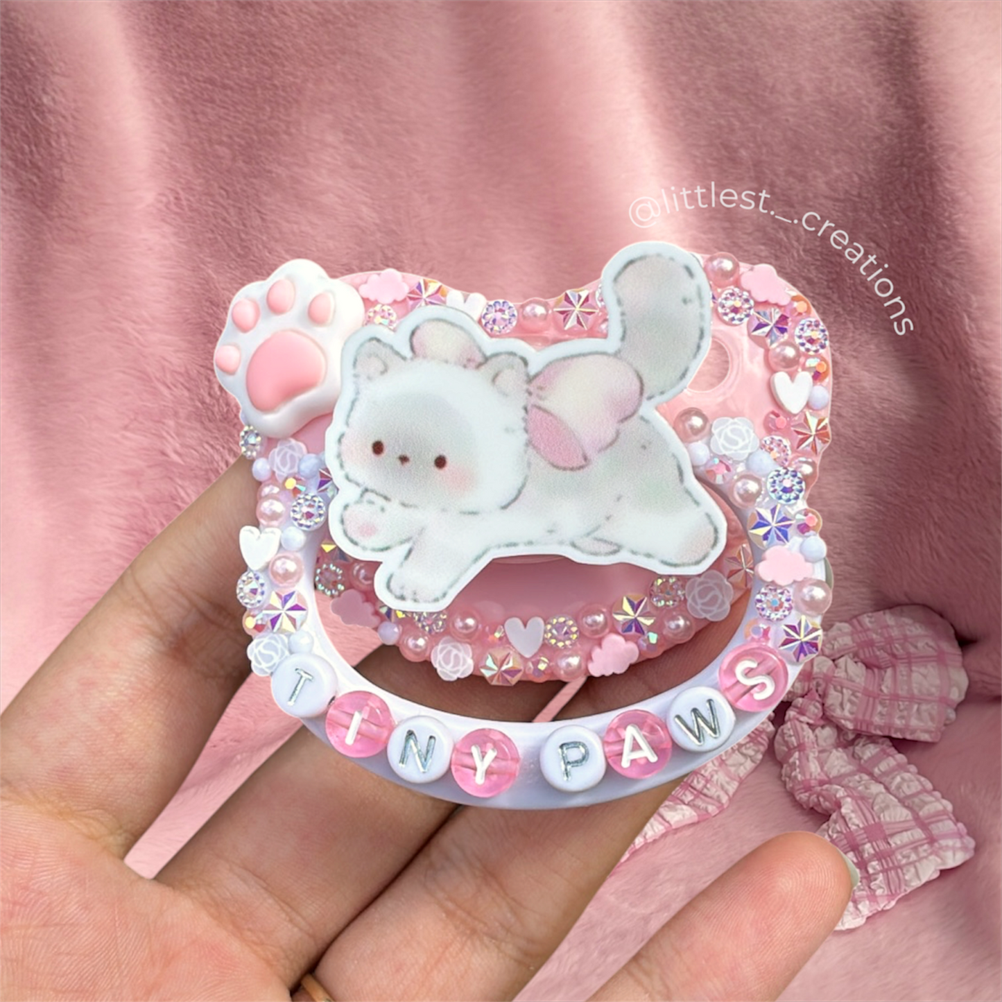 Tiny paws paci